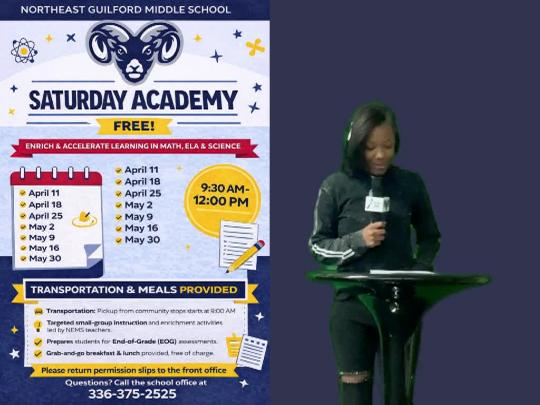 A student at Northeast Middle School reads into a microphone during a school news broadcast.