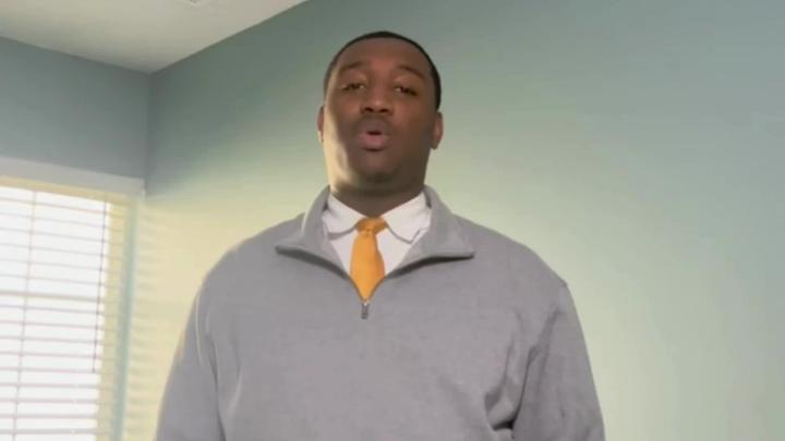 A&T 4 Middle College Student in gray sweater